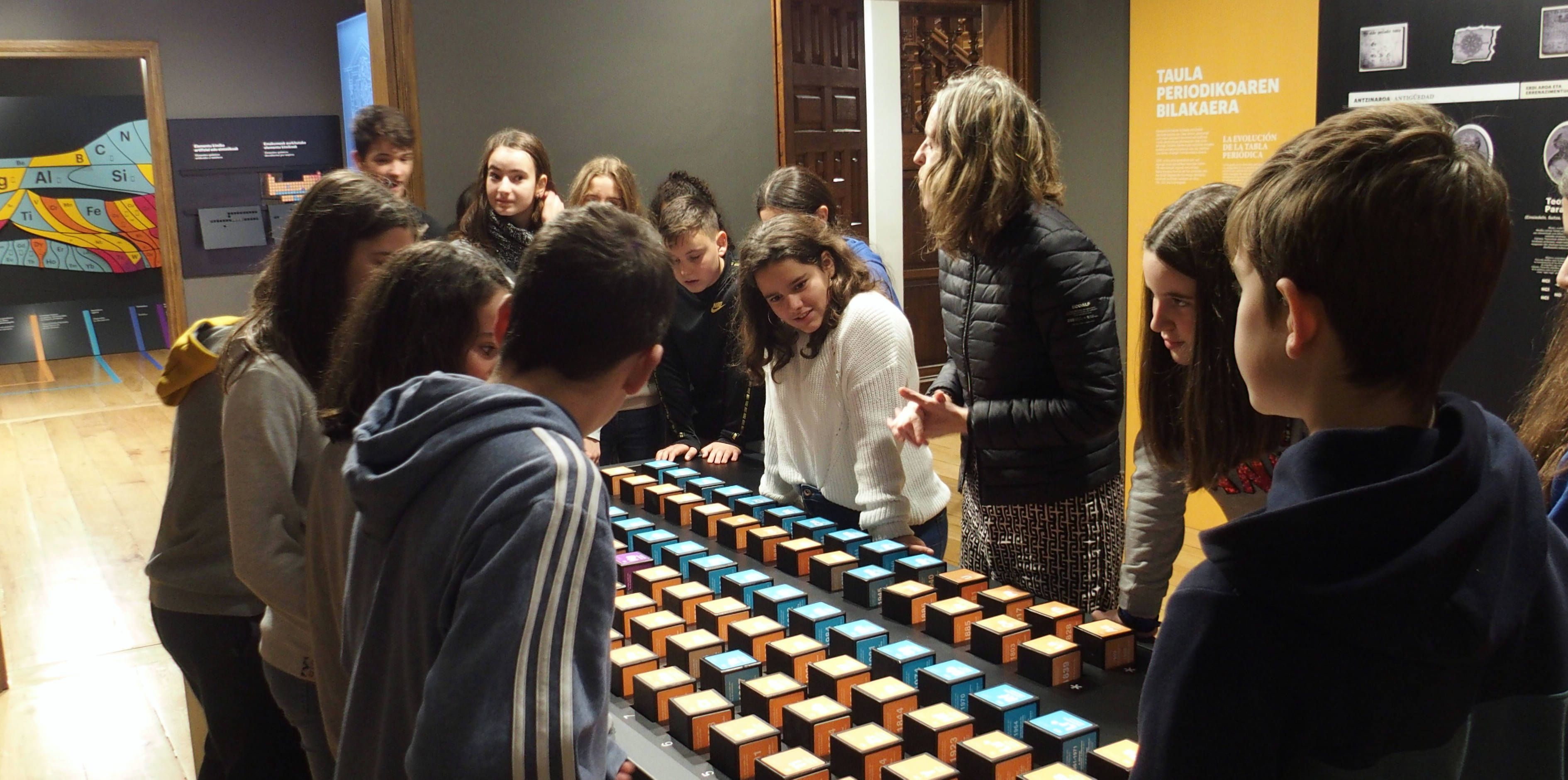 Students visiting the temporary exhibition on the periodic table.